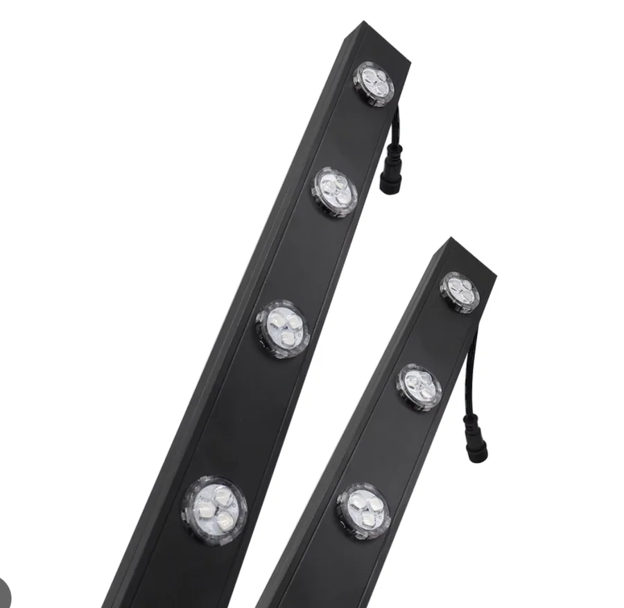 Black aluminium light track with round clear LED pods mounted along it